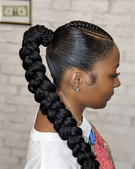 braided up into a ponytail|long braided ponytail hairstyles.